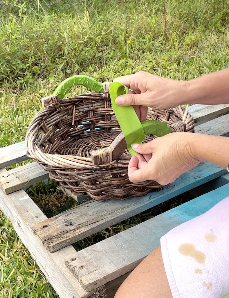 Wrapping Frogtape around the handles of the basket