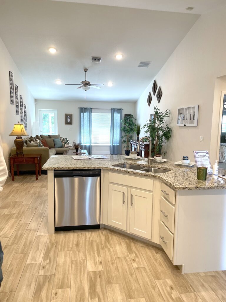 Angled kitchen island open to family room