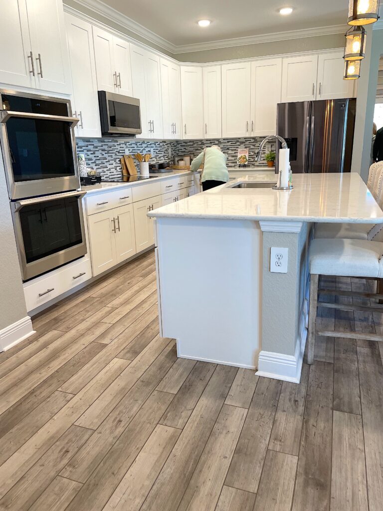 White cabinets and stainless steel appliances