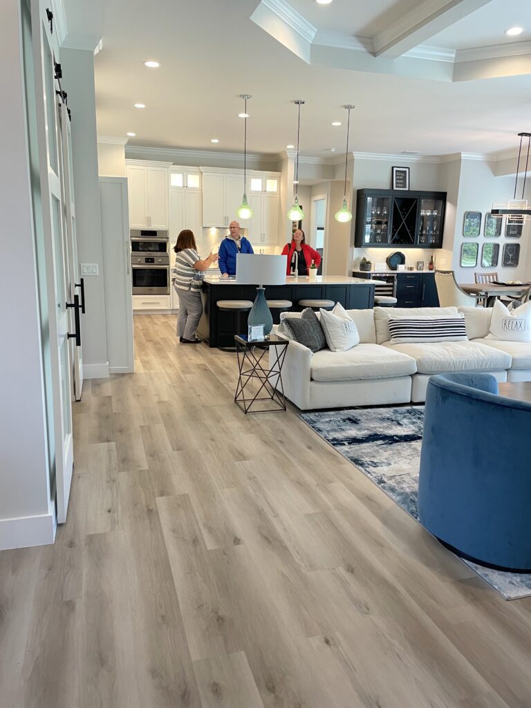 Kitchen design with dark kitchen island and it's double