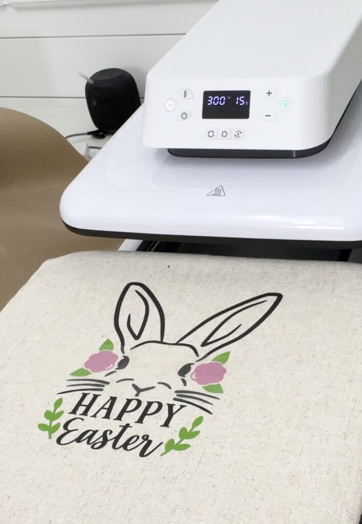 Heat transfer vinyl on HTVRONT heat press machine Easter Bunny with pink flowers