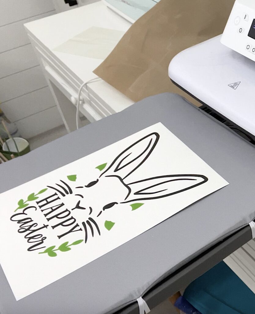Heat transfer vinyl with green leaves on paper