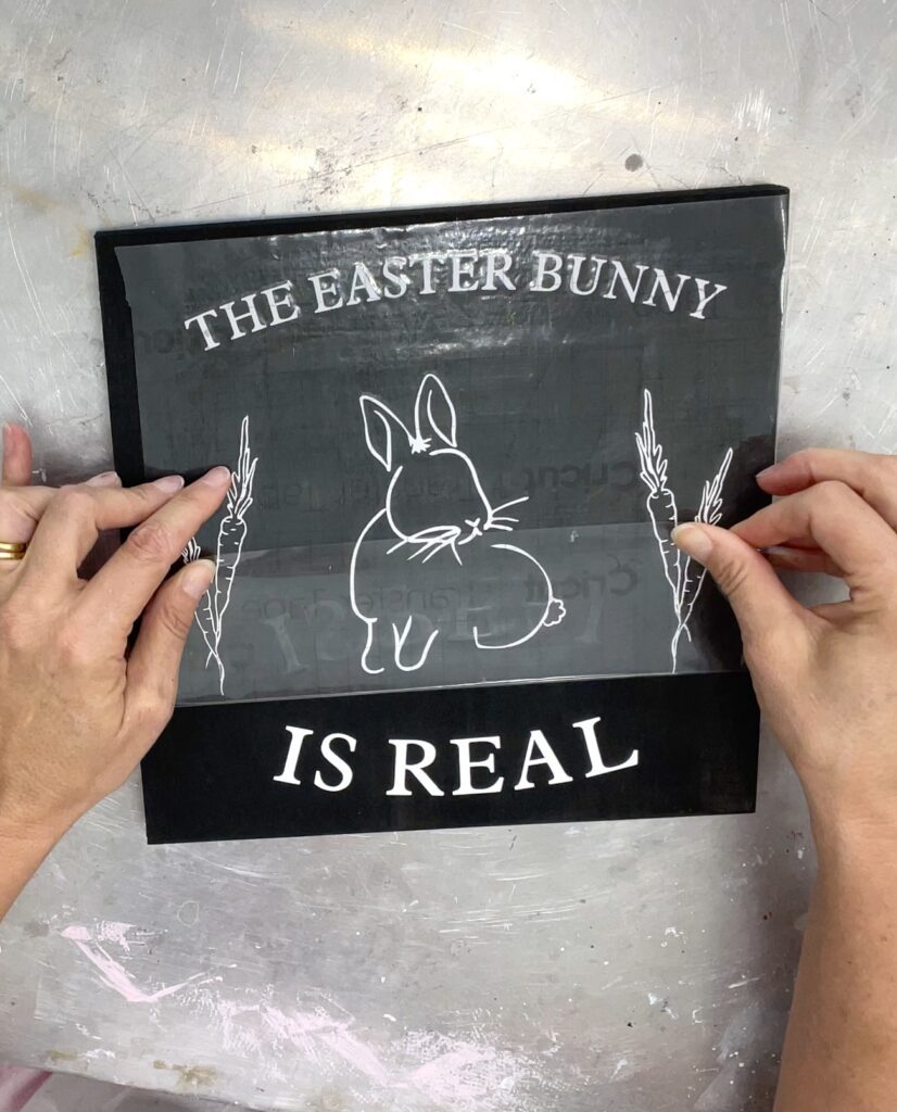 Removing transfer tape from the Easter Bunny is real sign