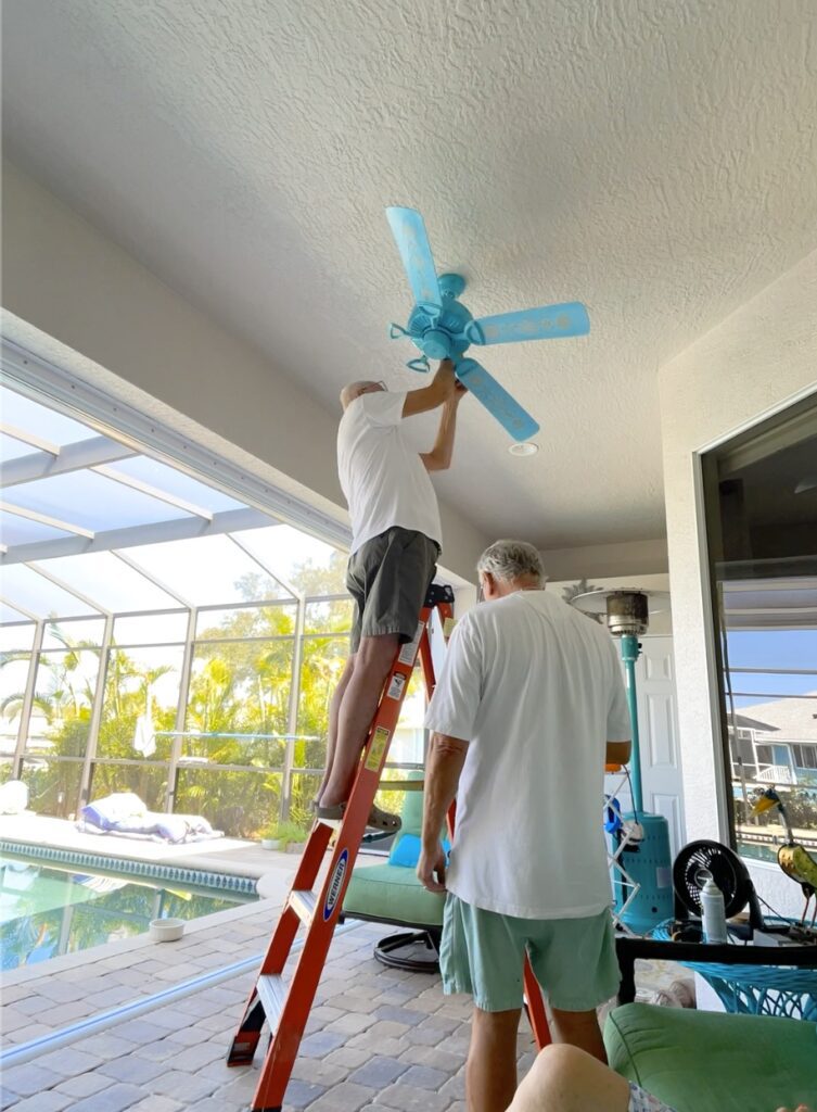 Dad reinstalling ceiling fan