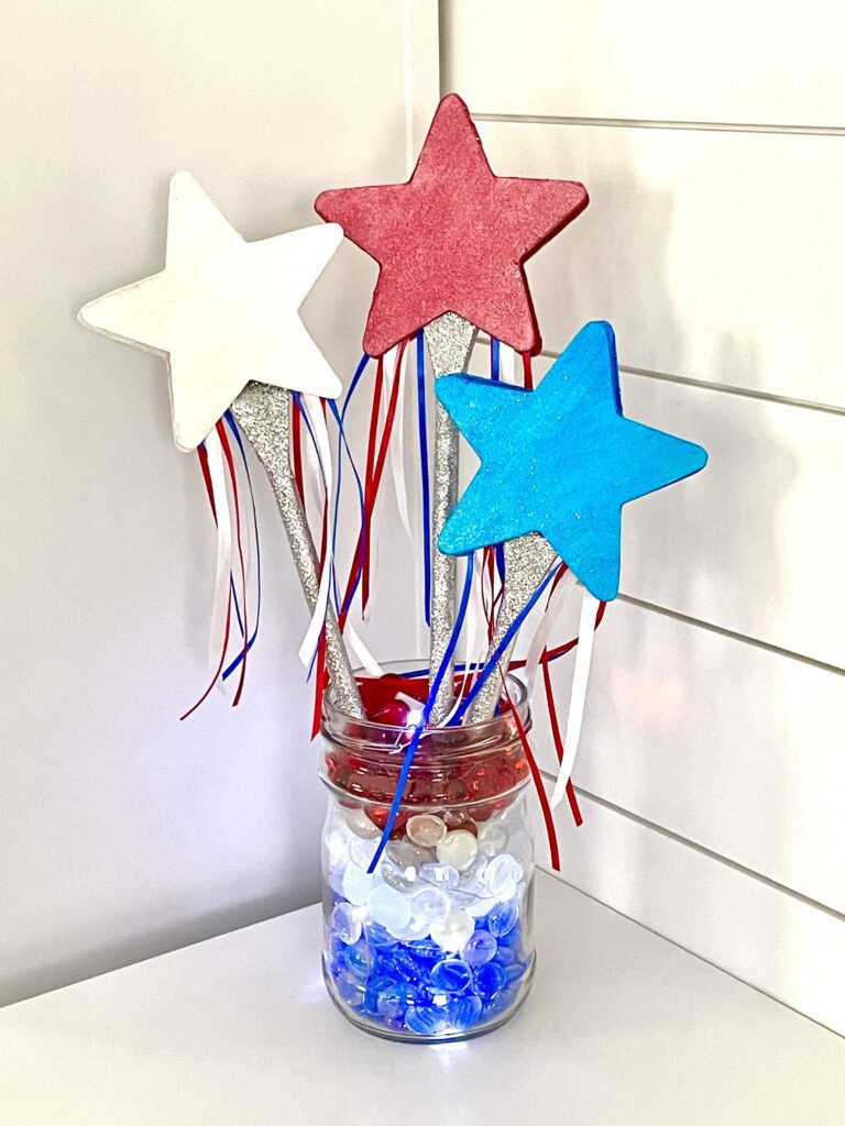 Fourth of July celebration centerpiece diy with red white and blue stars
