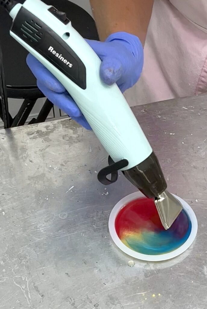 Using Resiners mini heat gun to show how to color-blend the resin colors
