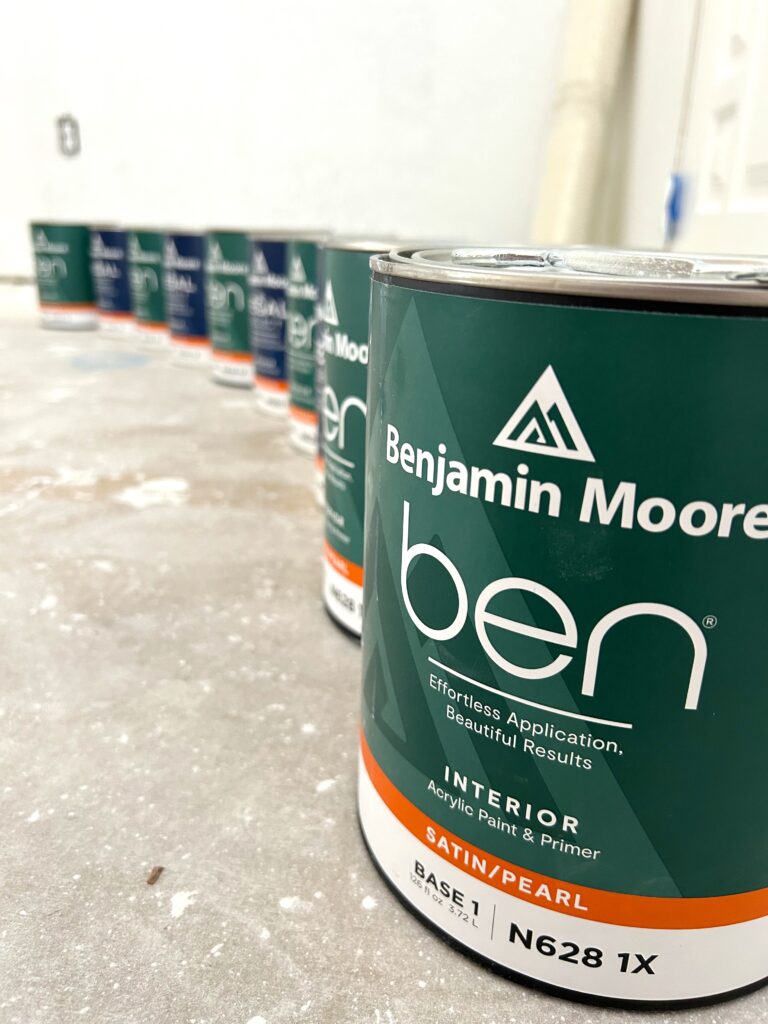 Benjamin Moore cans lined up