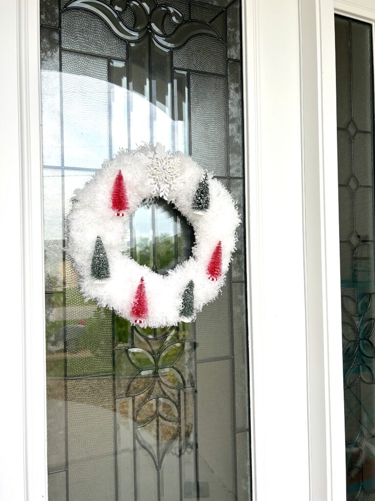 Finished Christmas wreath with bottle brush trees