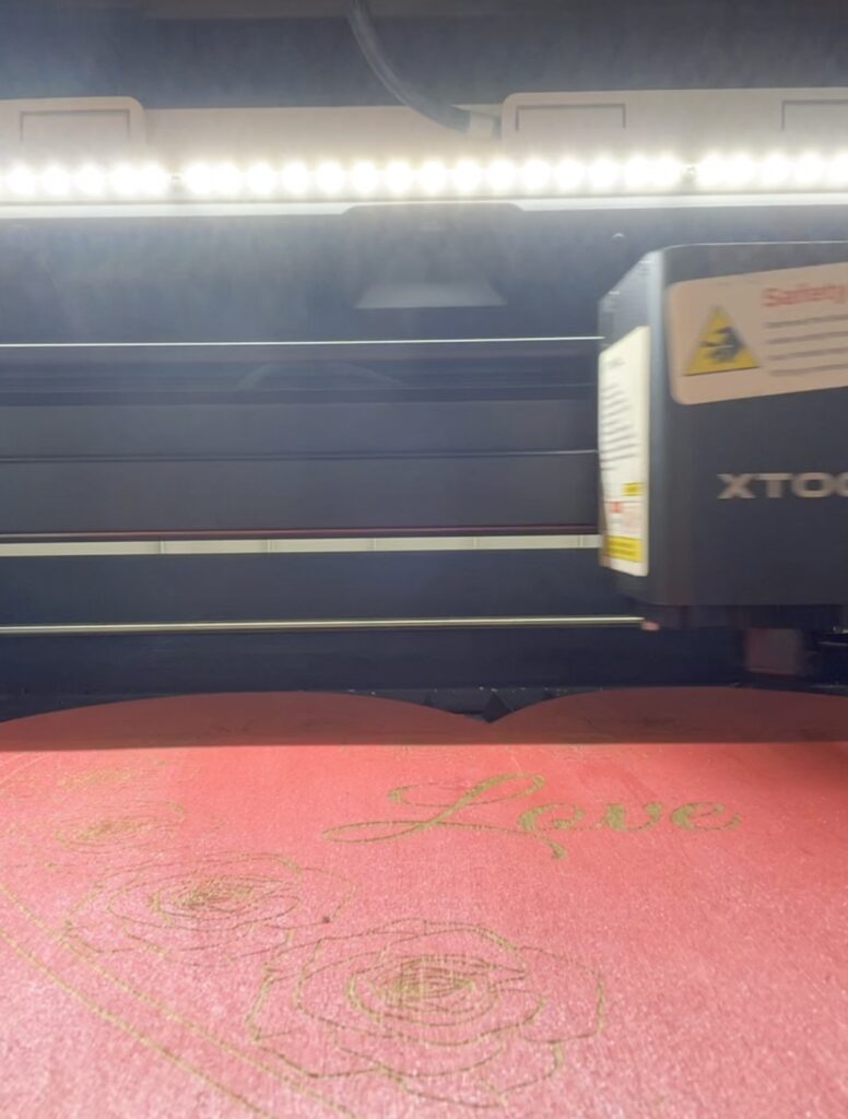 Using a laser engraver to engrave Love on hearts
