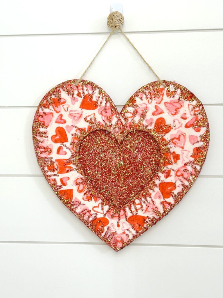 Dollar Tree heart DIY bursting with glitter