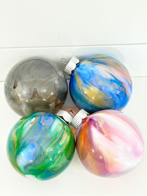finished glass ornaments decorated with paint