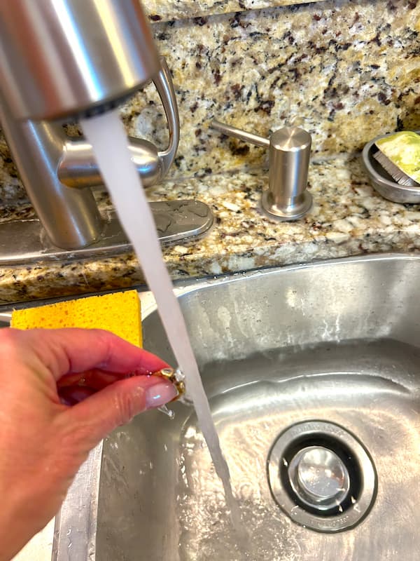 Rinsing ring off in sink