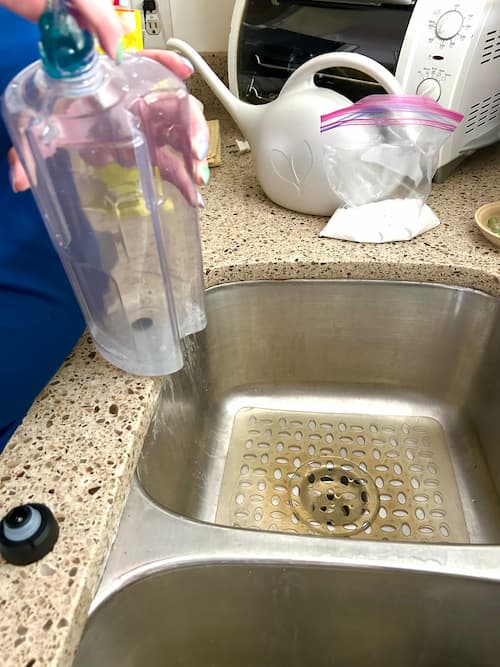 Squishing a Tide pod into the clean water tank