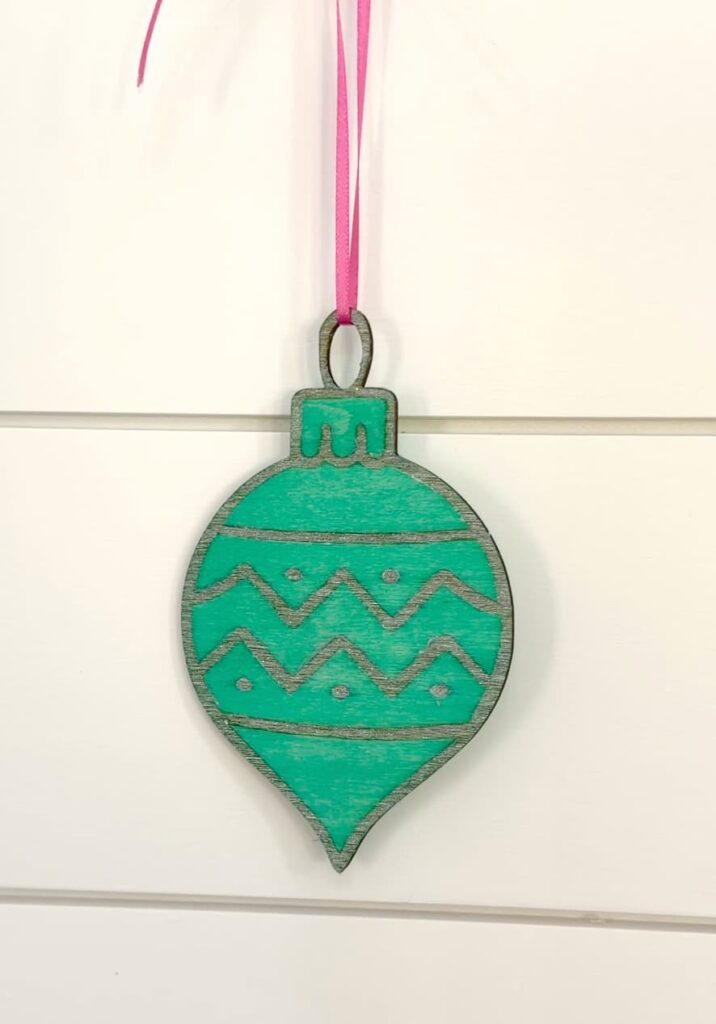 Finished wood engraved ornament for Christmas