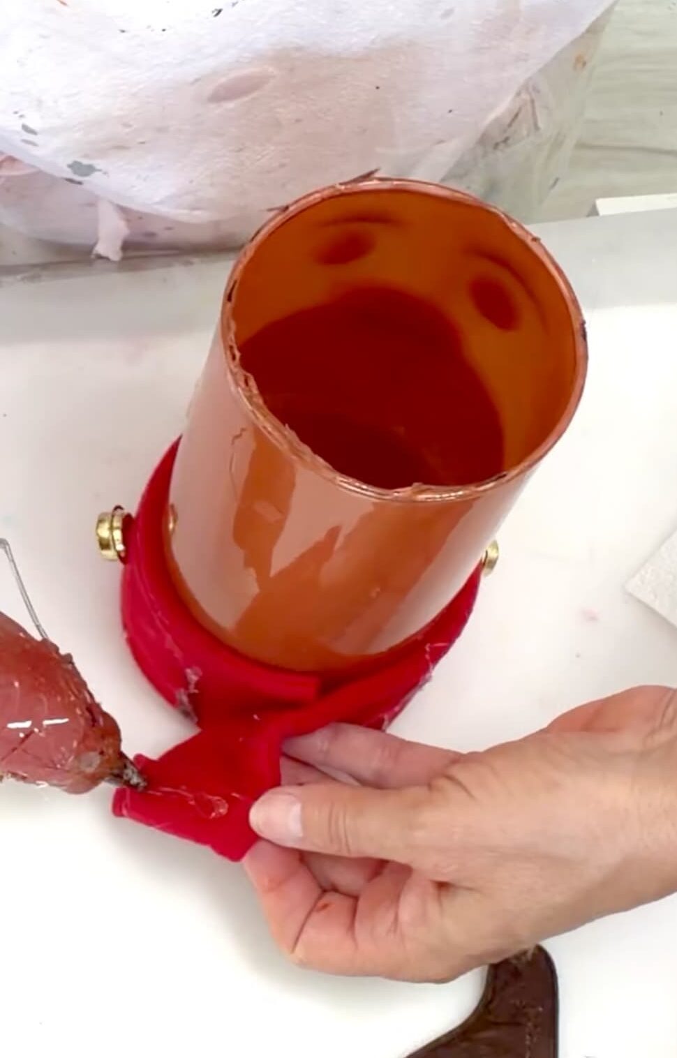 Gluing the collar of the reindeer craft