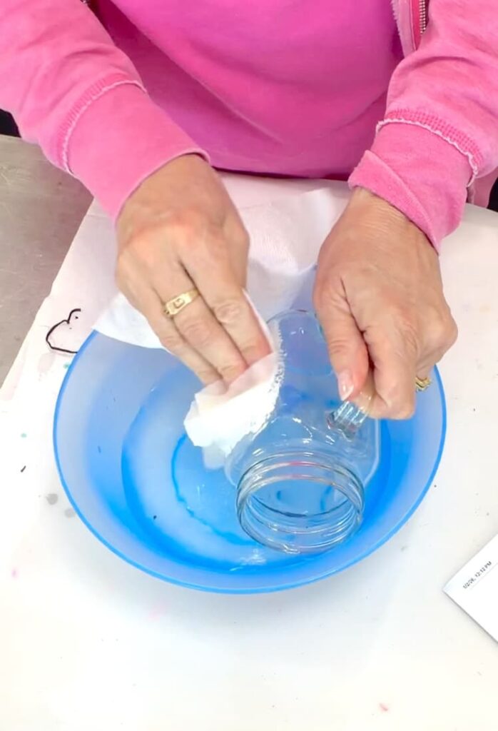 Washing the glass after the laser engraving