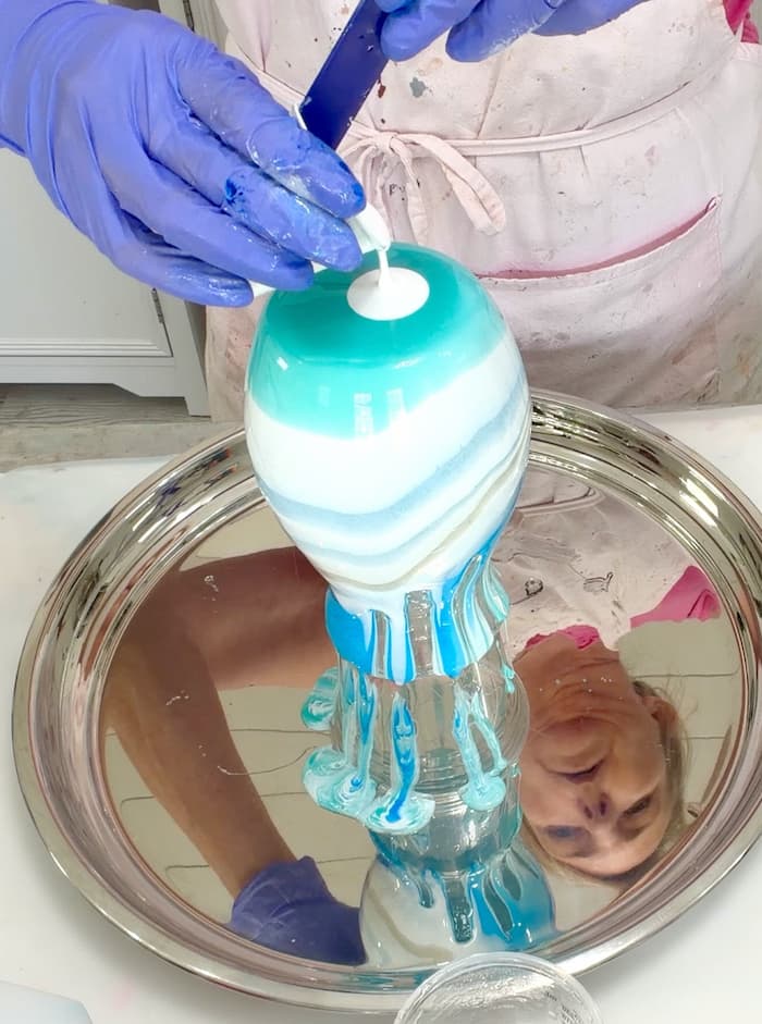 Pouring resin over dollar tree vase for easy resin ocean art