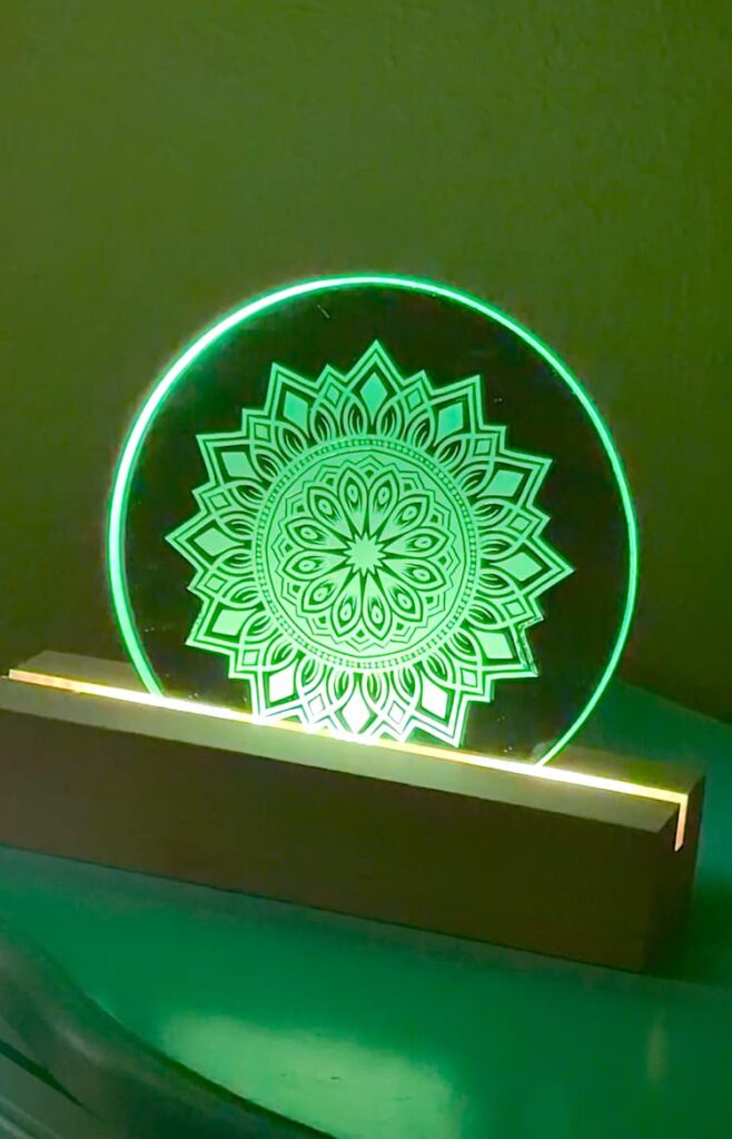 The final reveal on how to make a nightlight project with the mirror placed on an LED strip lit up green