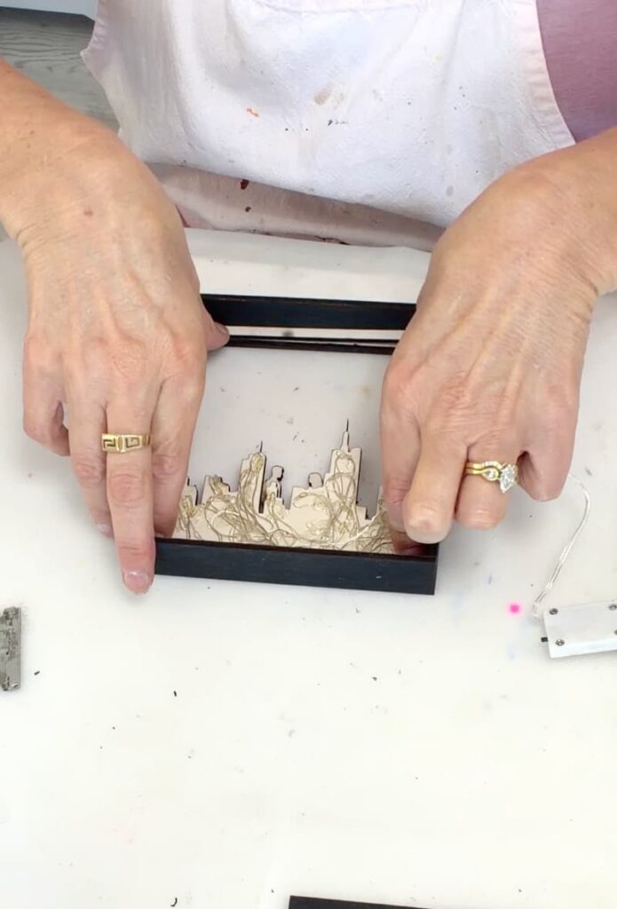 Putting the layers of the Valentine's Day shadowbox together