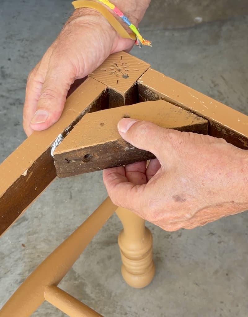 reattaching the corner brackets with glue