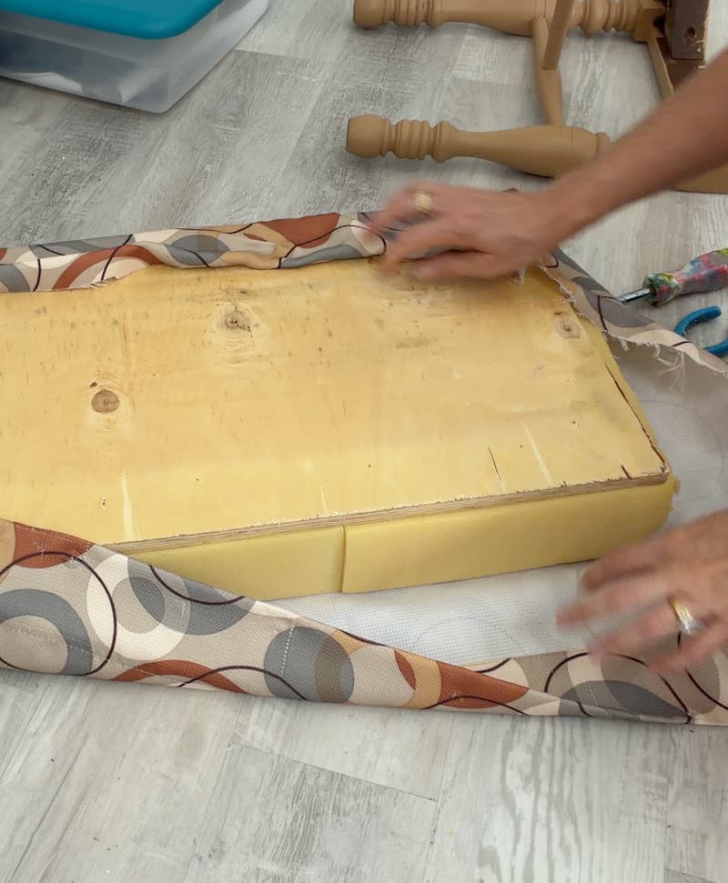 removing the old retro fabric before reupholstering