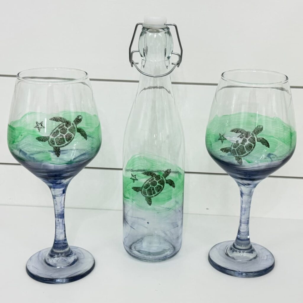Decorated with glass painting dollar tree wine glasses and bottle