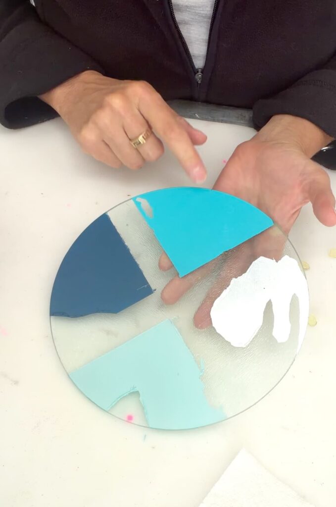 pointing at the Rust Oleum 2X ultra cover spray paint as the best glass paint