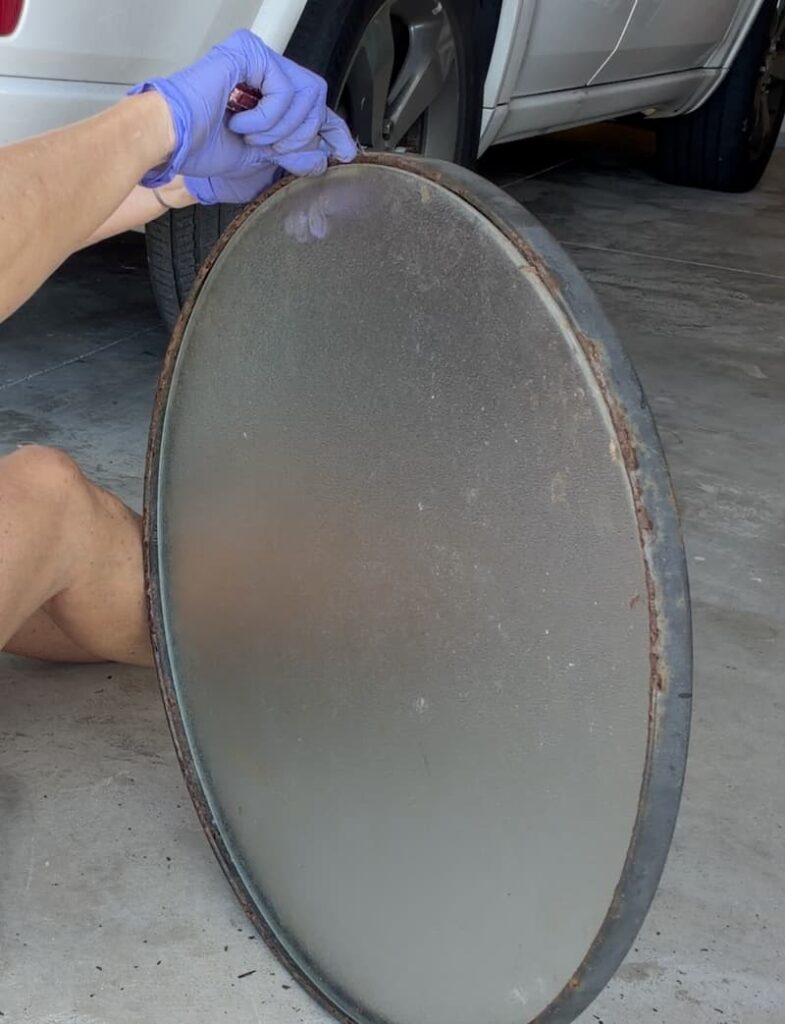 Removing glass inset from rusty metal tabletop