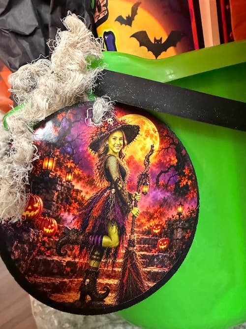 DIY Halloween treats tag girl witch with book and leg bent