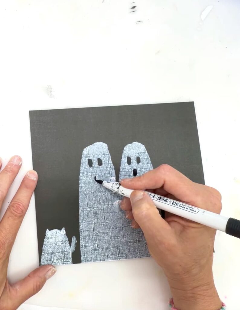 easy paint idea finishing the ghost art faces